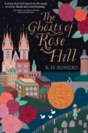book cover for The Ghosts of Rose Hill featuring a stylized illustration of a castle and city scape against a night sky, with a mass of flowers and a cemetery in the foreground, with a figure in a dress and wide-brimmed hat, A river with swans separates the graveyard from the city, and a figure in a gray waistcoat stands on a bridge between the city and cemetery, looking towards the figure in the dress.