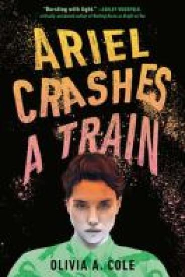 book cover for Ariel Crashes a Train, featuring a black background with the title in chalky yellow orange and pink capital letters.  The text is jagged and out of alignment like it got crashed into, and sits above the head of a teen, portrayed from the shoulders up, with reddish brown hair that is either short or pulled back, and an intense, sullen expression.  Their face is in washed out black and white, but their button down shirt is bright green with alligators on it